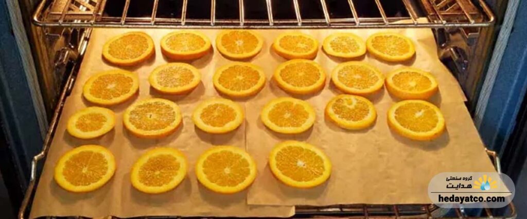استفاده از دستگاه‌های میوه خشک کن صنعتی گروه صنعتی هدایت برای خشک کردن پرتقال در حجم بالا